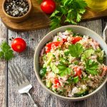 Food dieting concept, tuna salad. Couscous salad with conserved tuna.