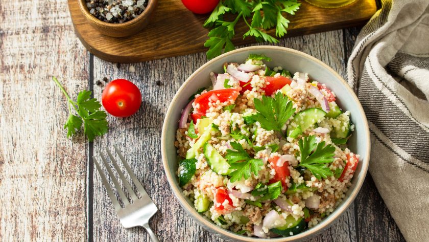 Food dieting concept, tuna salad. Couscous salad with conserved tuna.